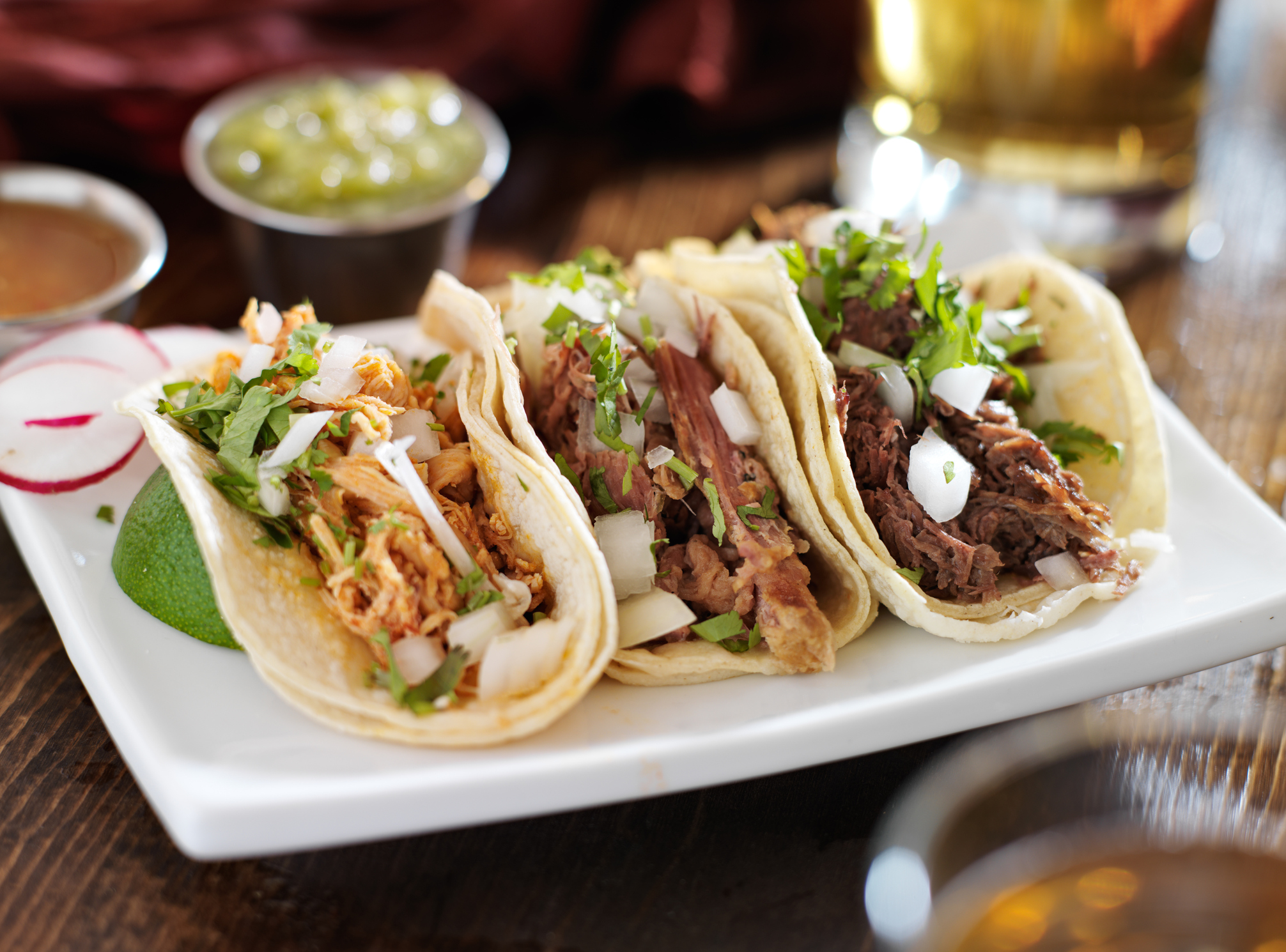 Three tacos on a plate