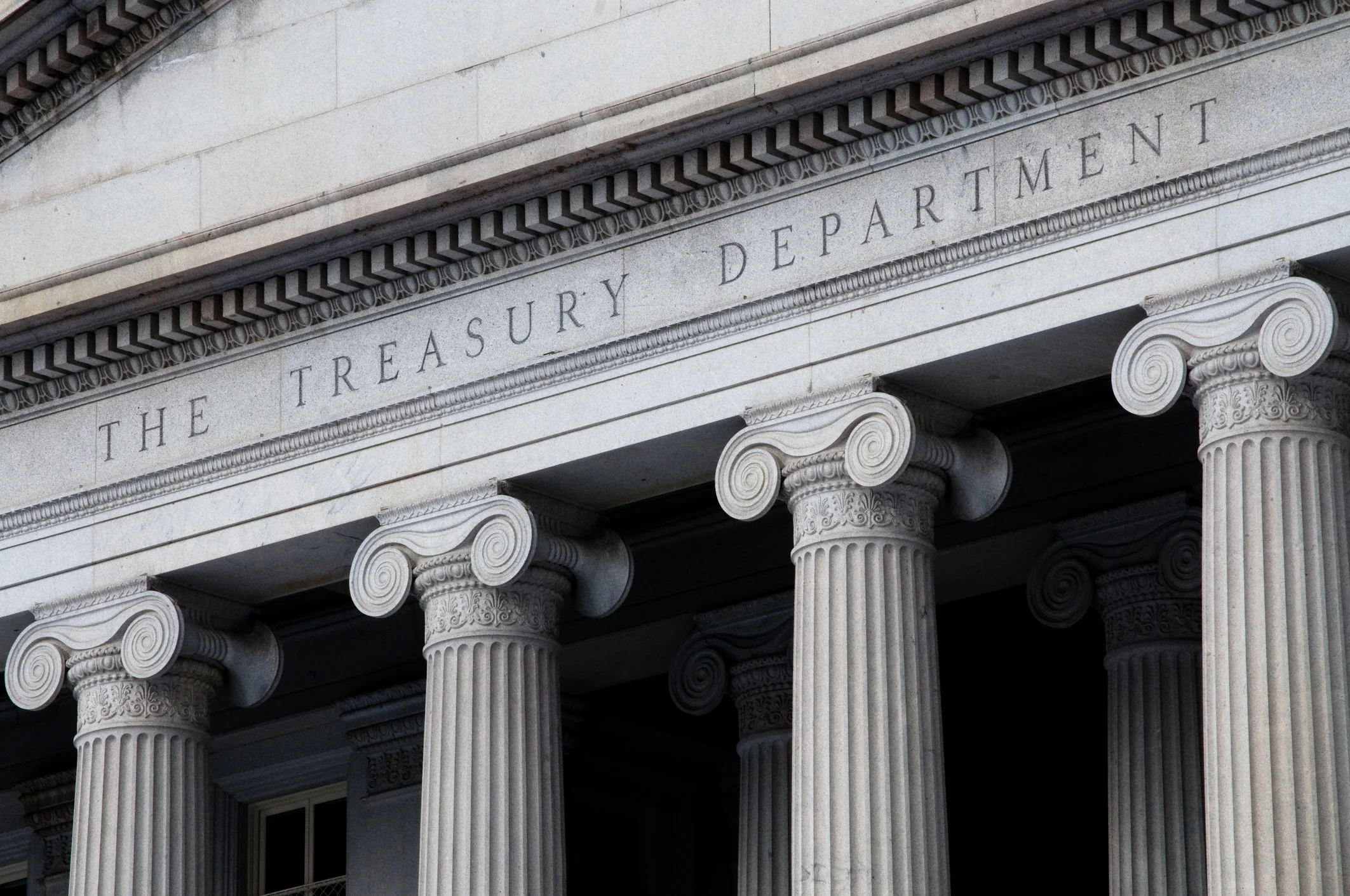 The Treasury building in Washington, labeled "The Treasury Department" at the front entrance