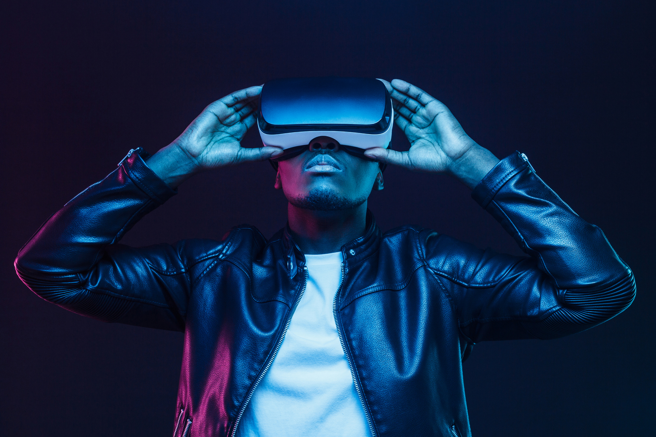 An individual with a virtual reality headset on.