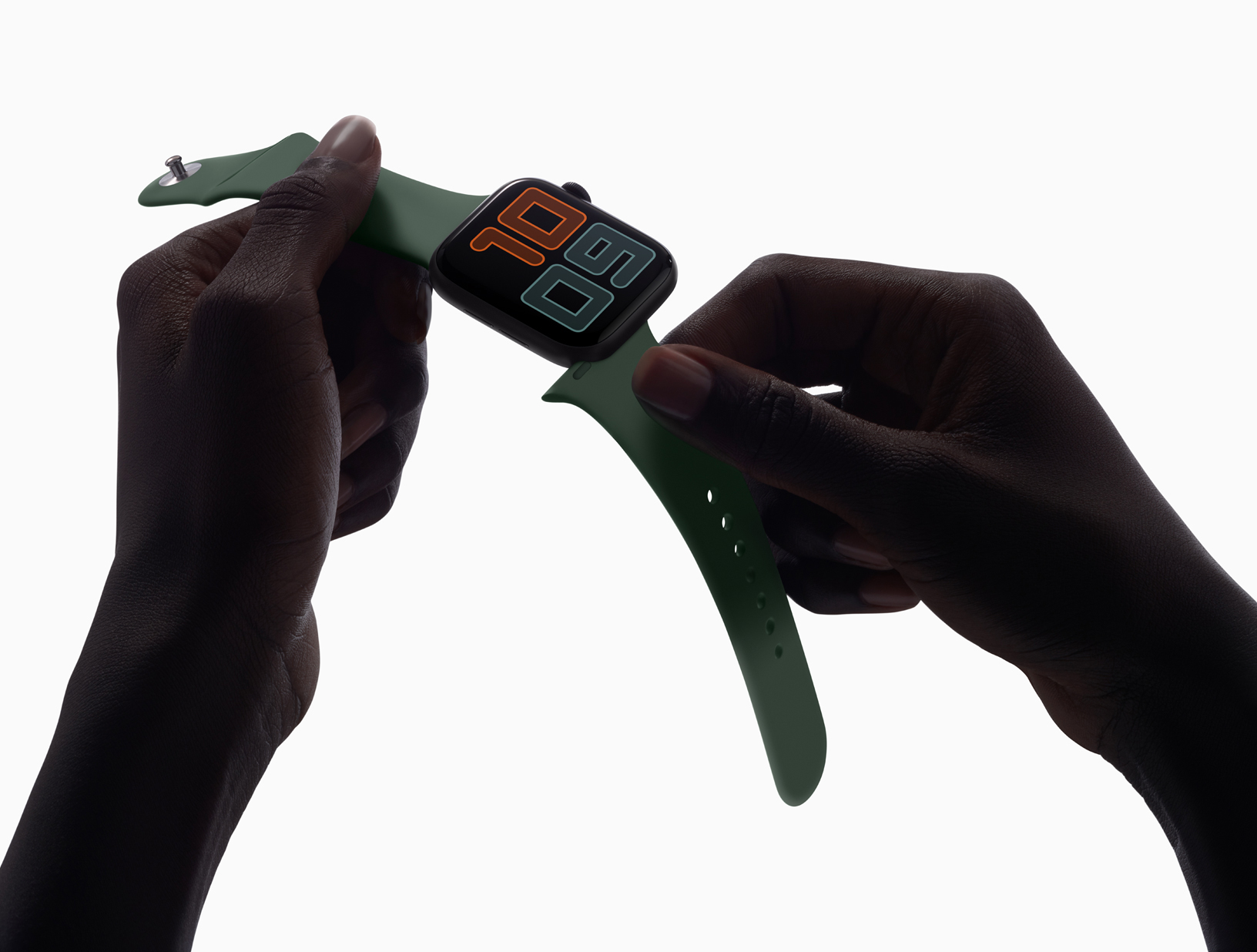 A person connecting a band to an Apple Watch Series 5