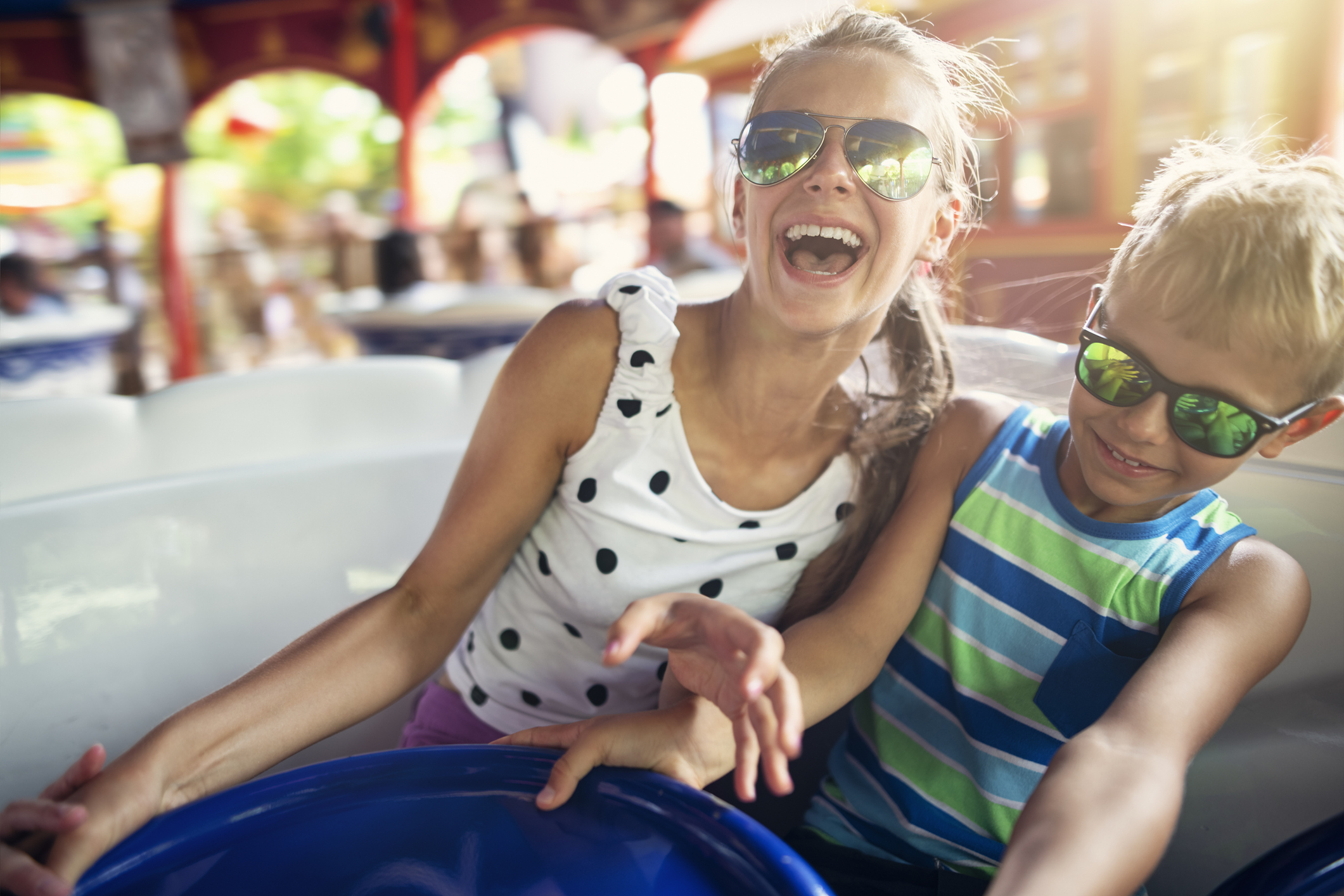 Kids on an amusement park ride.