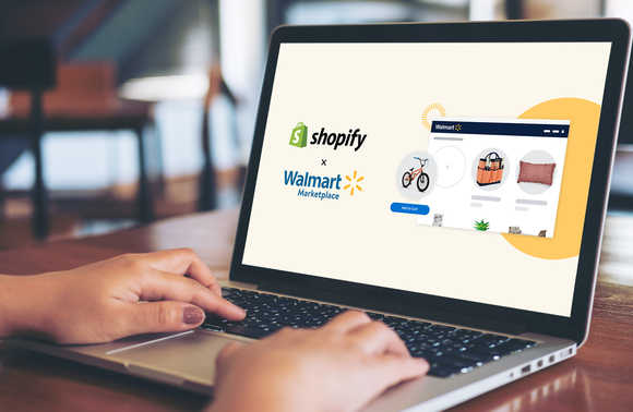 Hands on a laptop displaying Shopify and Walmart's collaboration.