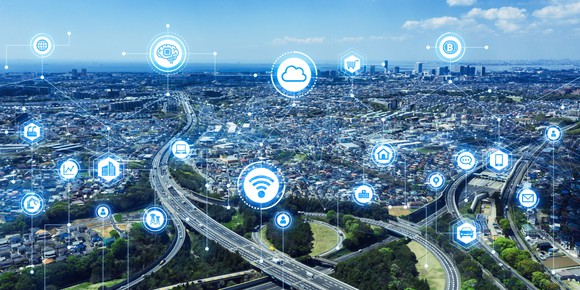 A map of a city with bubbles representing connected Internet devices. 