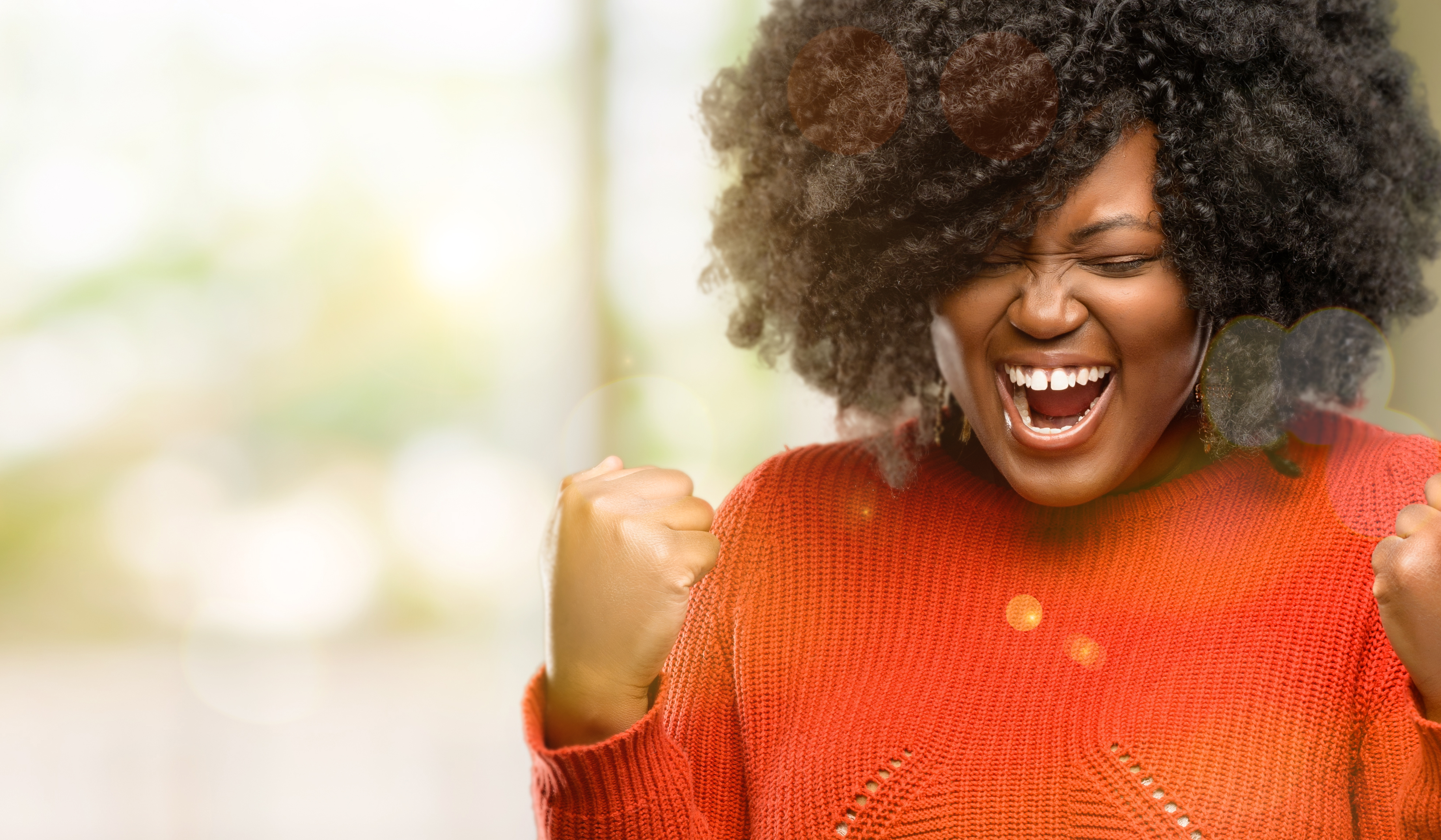 A lady celebrates victory after a big success.