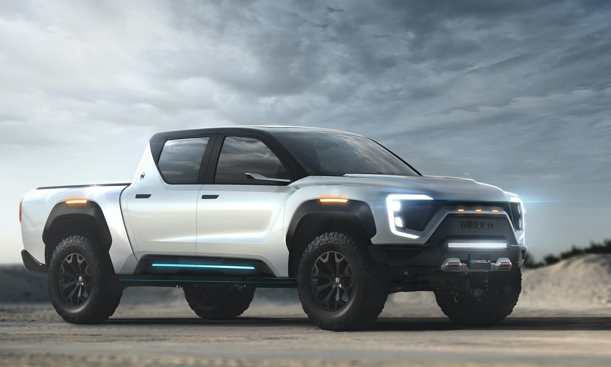 The Nikola Badger electric truck parked on a stretch of road.