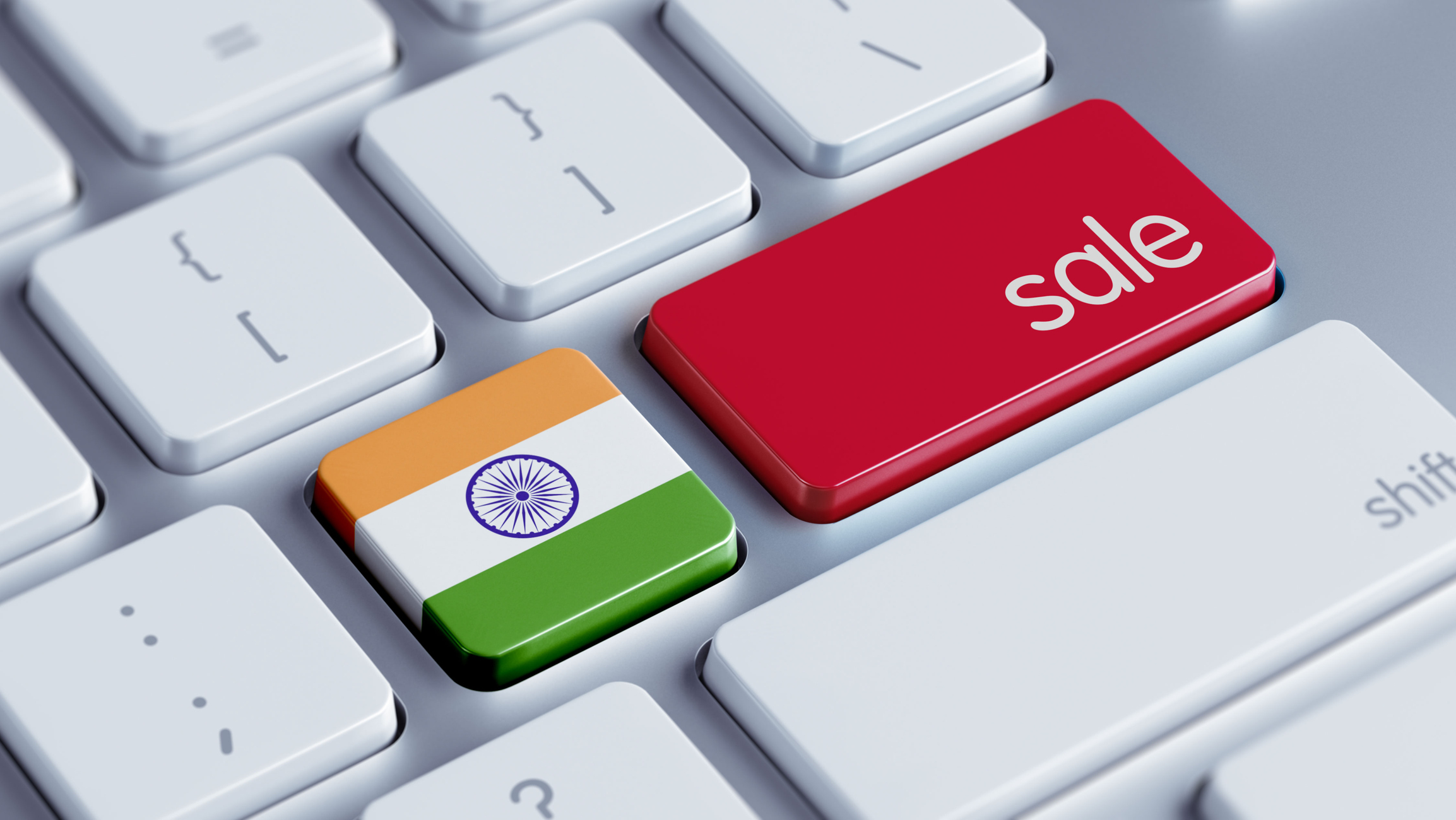 Computer keyboard with India flag and word sale