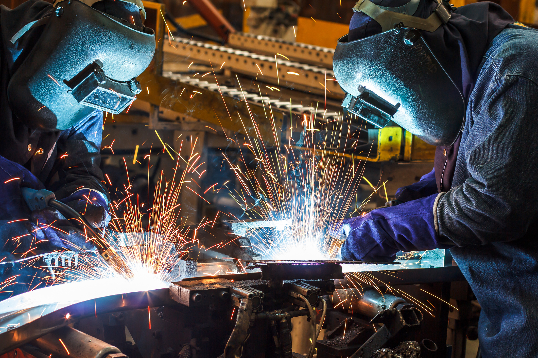 Metalworkers at work.