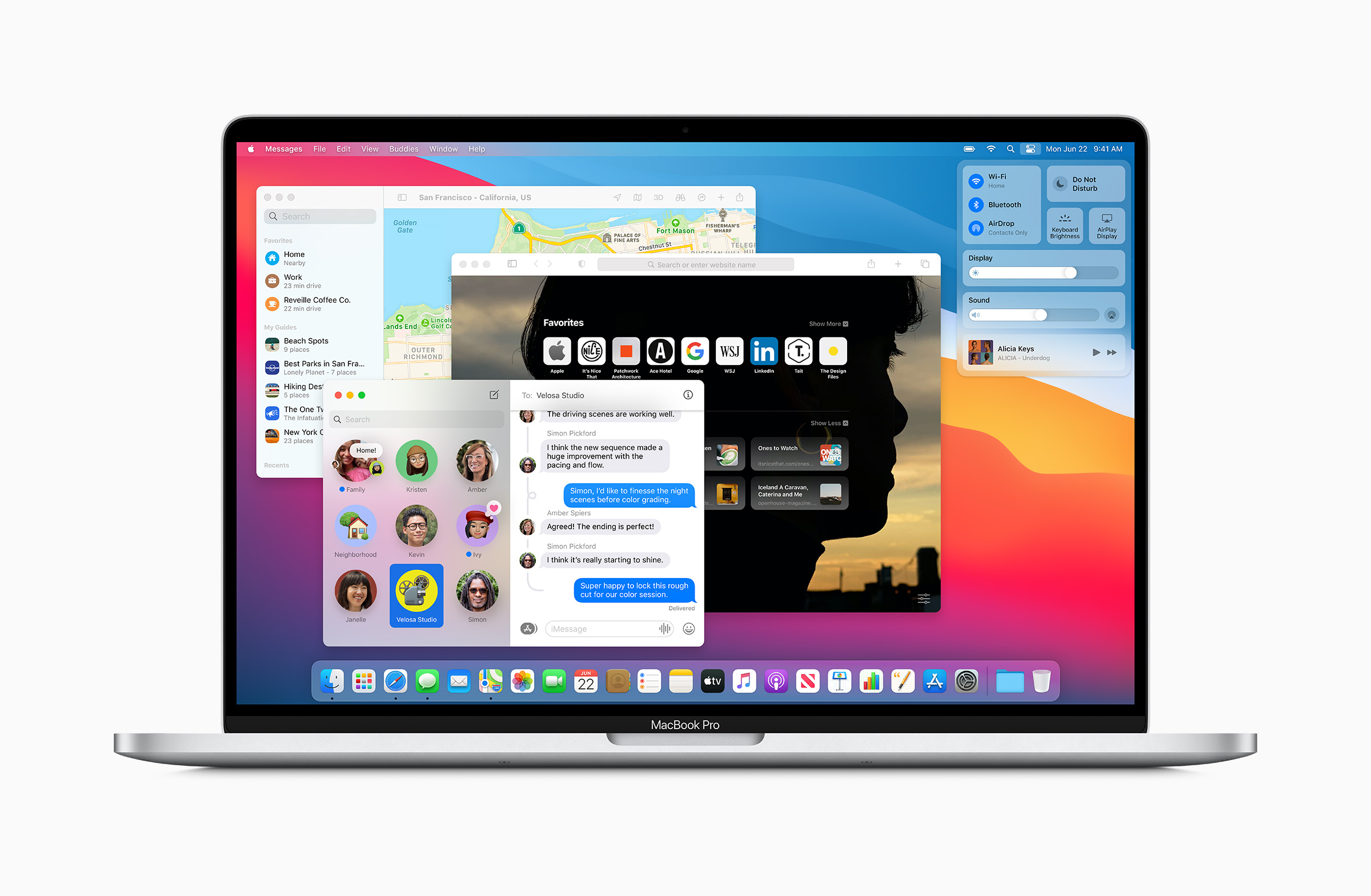 An Apple Mac laptop with a variety of apps open.
