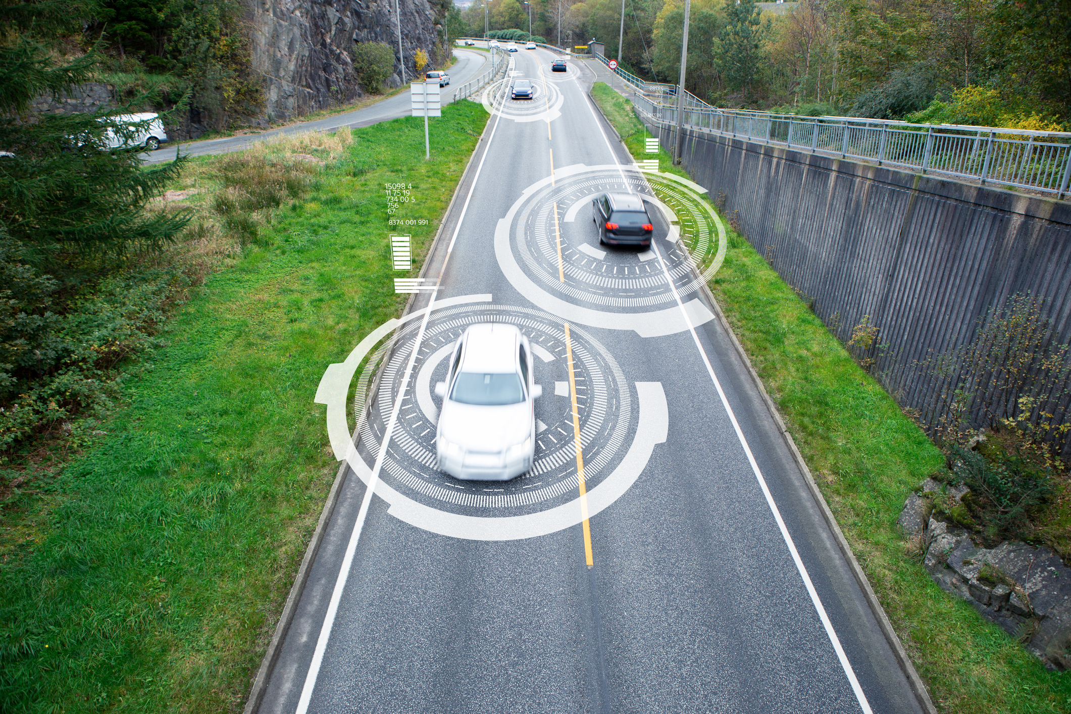 cars driving with a communications field around them
