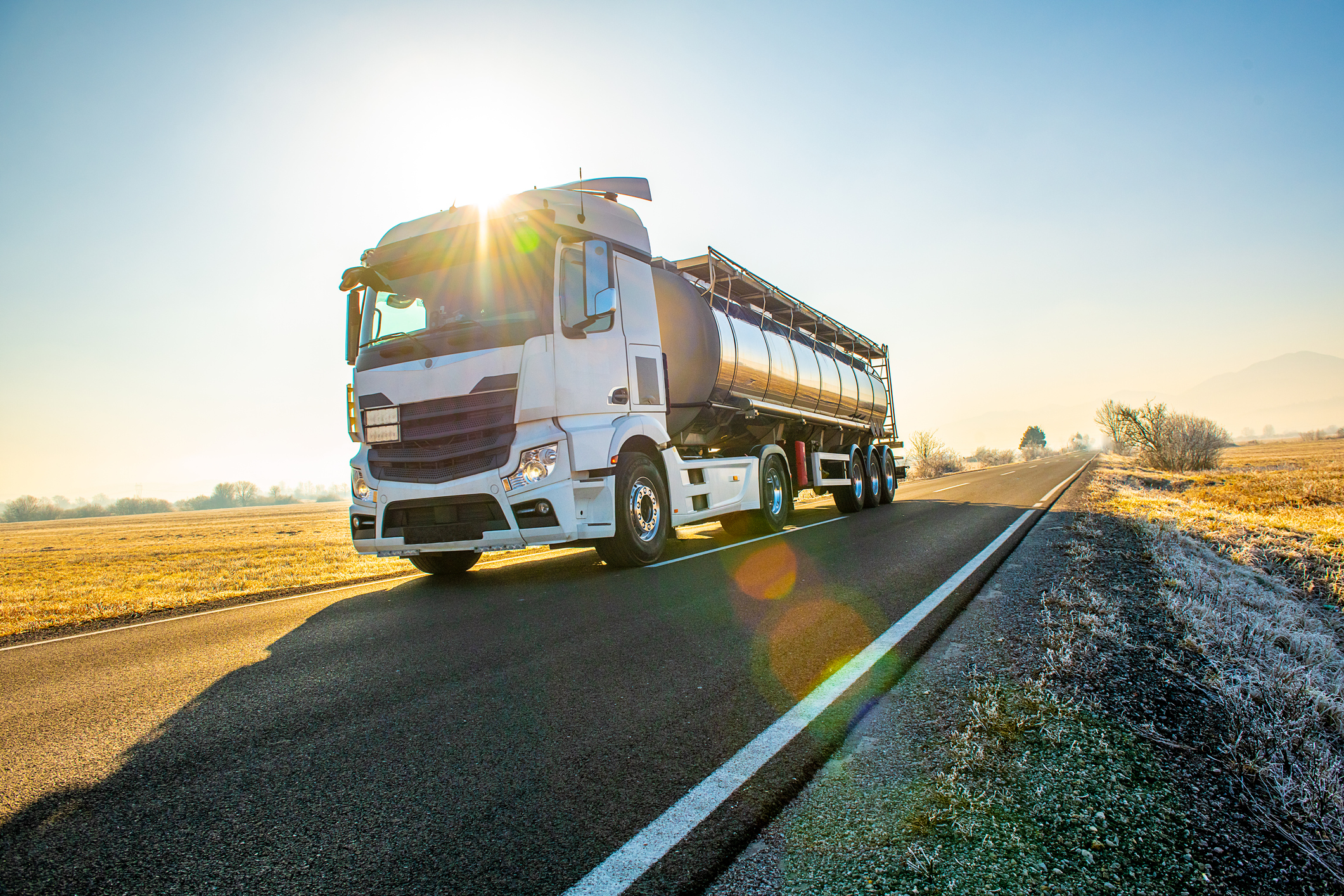 Natural gas truck driving on a highway.