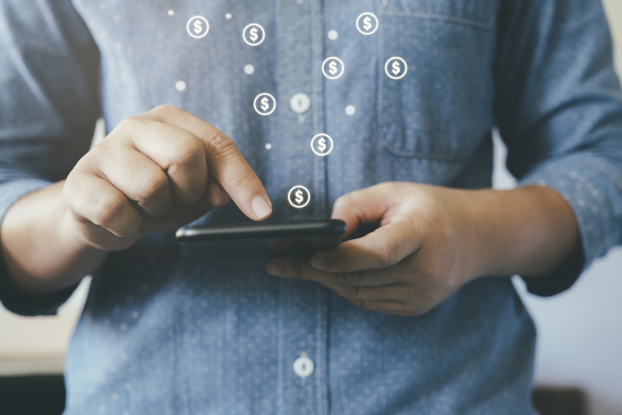 Man using fintech on his smartphone.