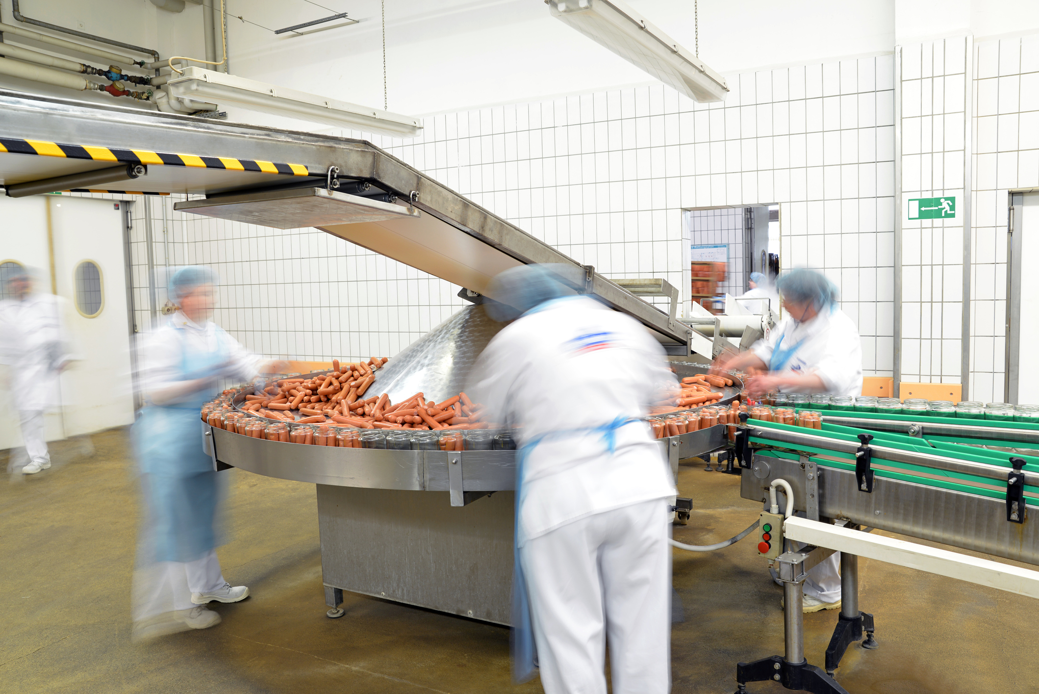 People working in meatpacking plant