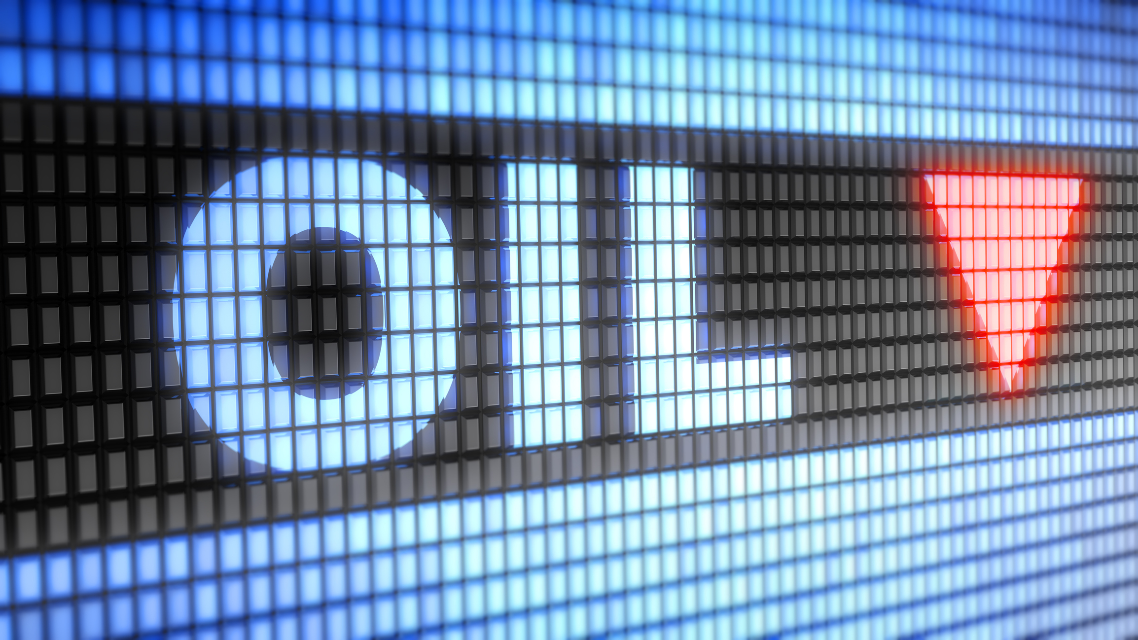 An electronic sign reading "Oil," followed by a downward red arrow.