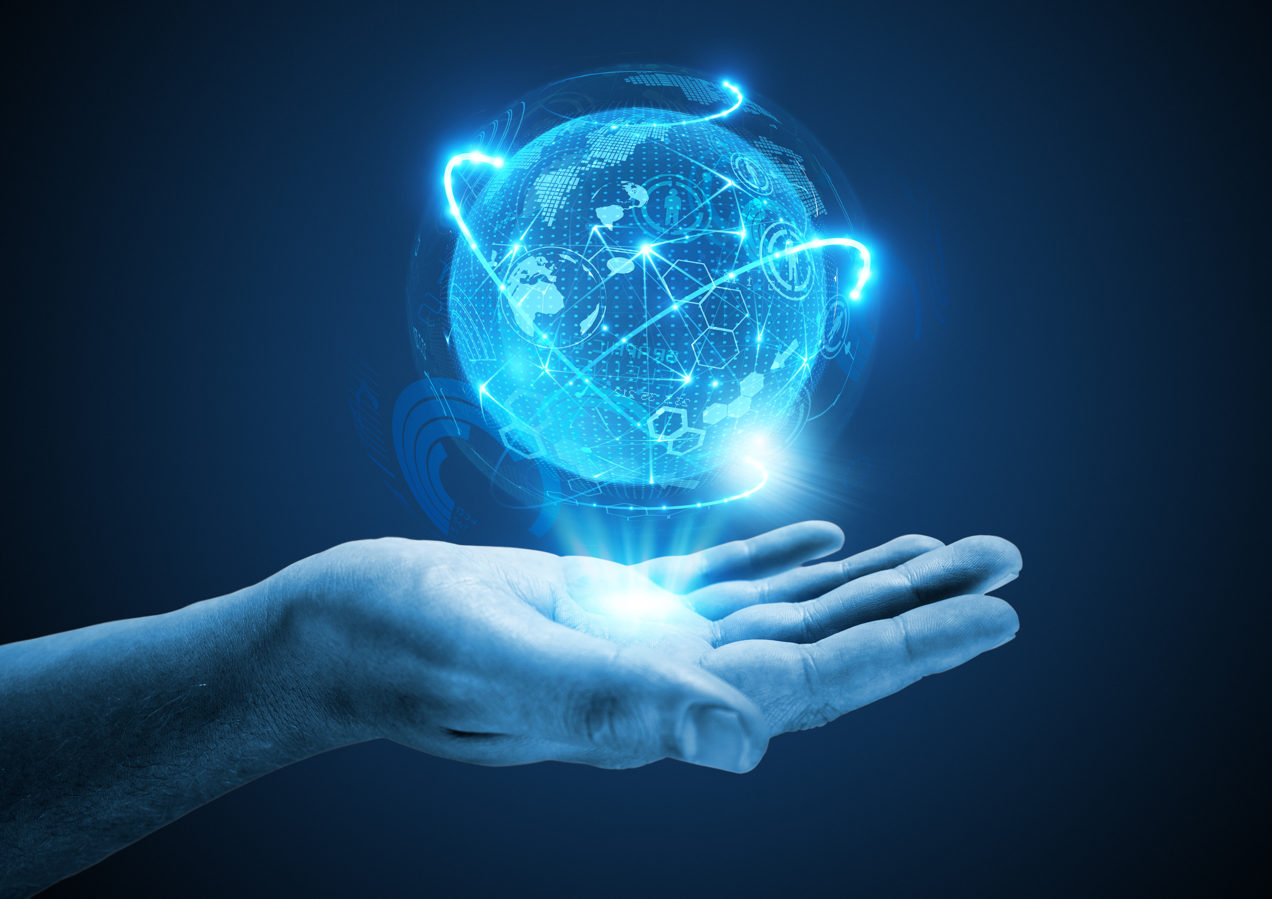 Hand with hologram of globe.