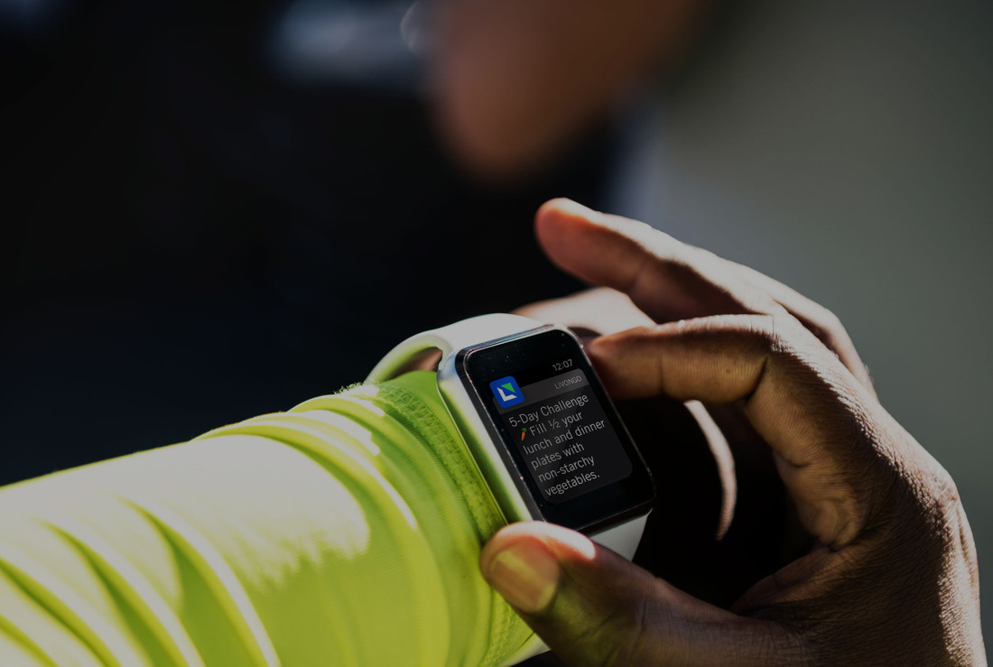 A smartwatch showing a notification from Livongo.