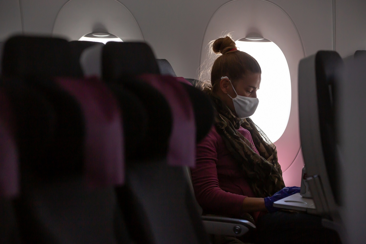 airline passenger with facemask