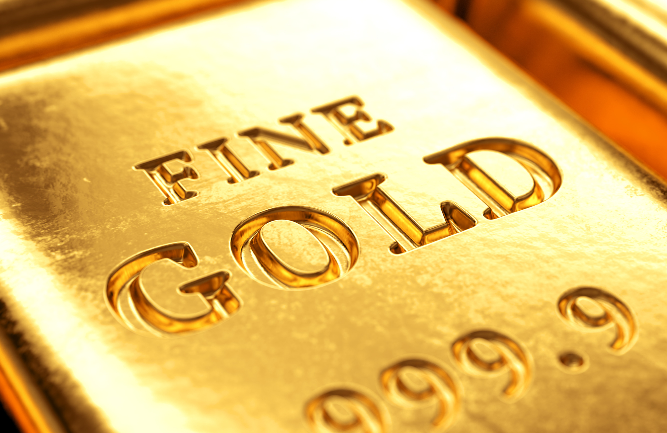 A closeup of a bar of gold.