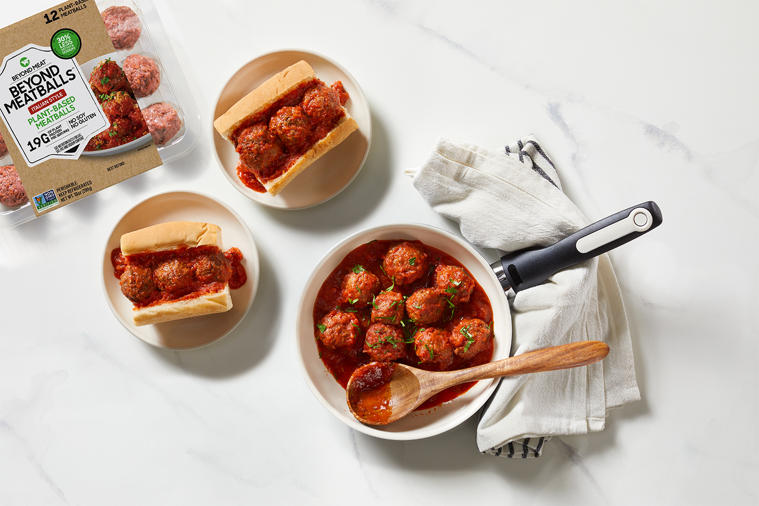 Beyond Meat's new retail product, Beyond Meatballs, displayed in its retail packaging and prepared in menu items.