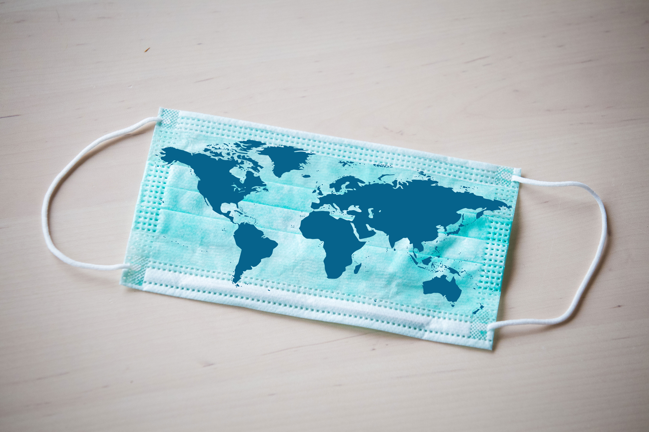 Mask showing map of the world.