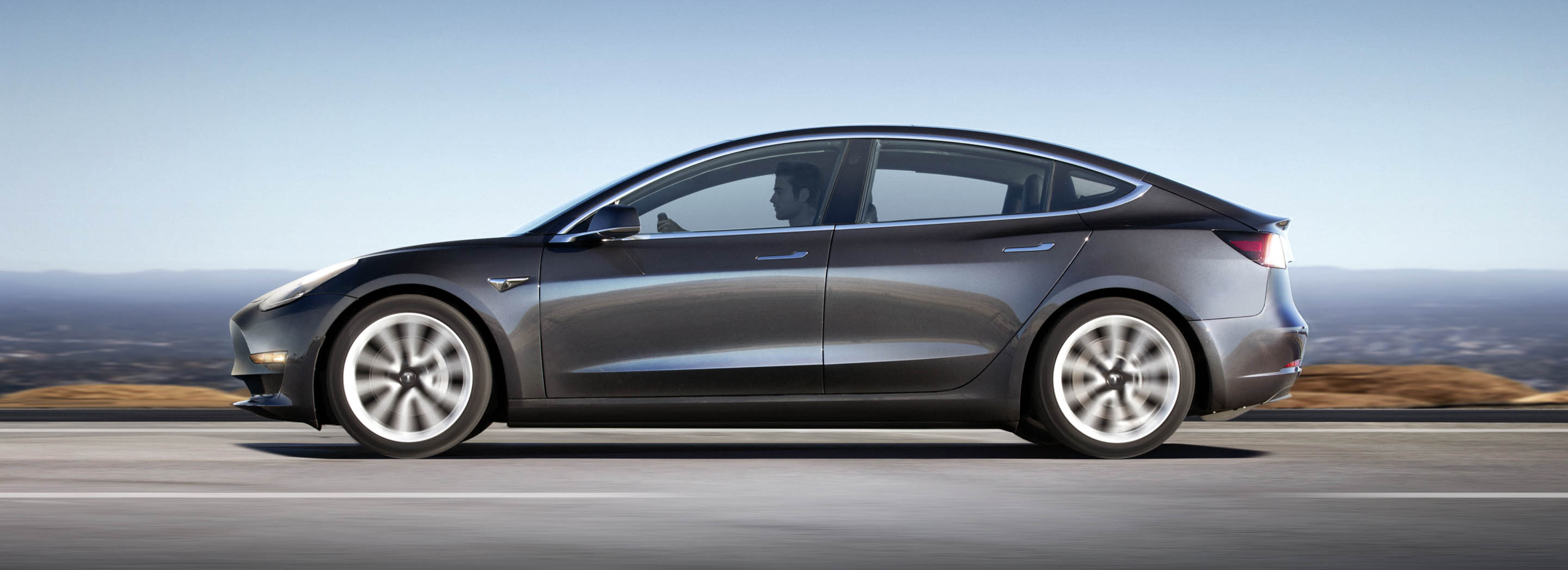 Model 3 viewed in profile outside.
