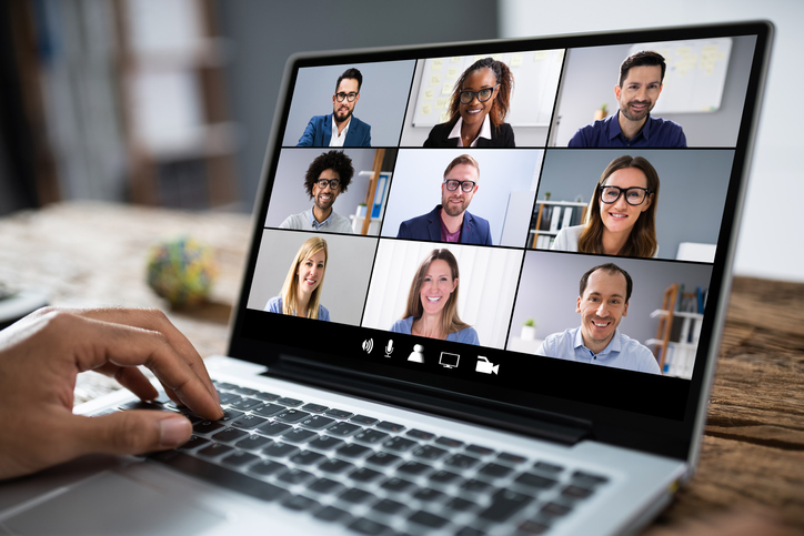 Laptop screen displaying a video conference call