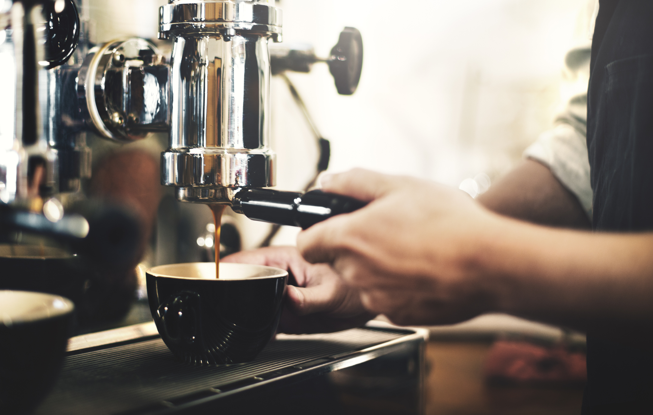 Barista making a cup of espresso.