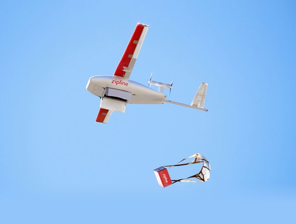 Zipline drone parachuting in a delivery