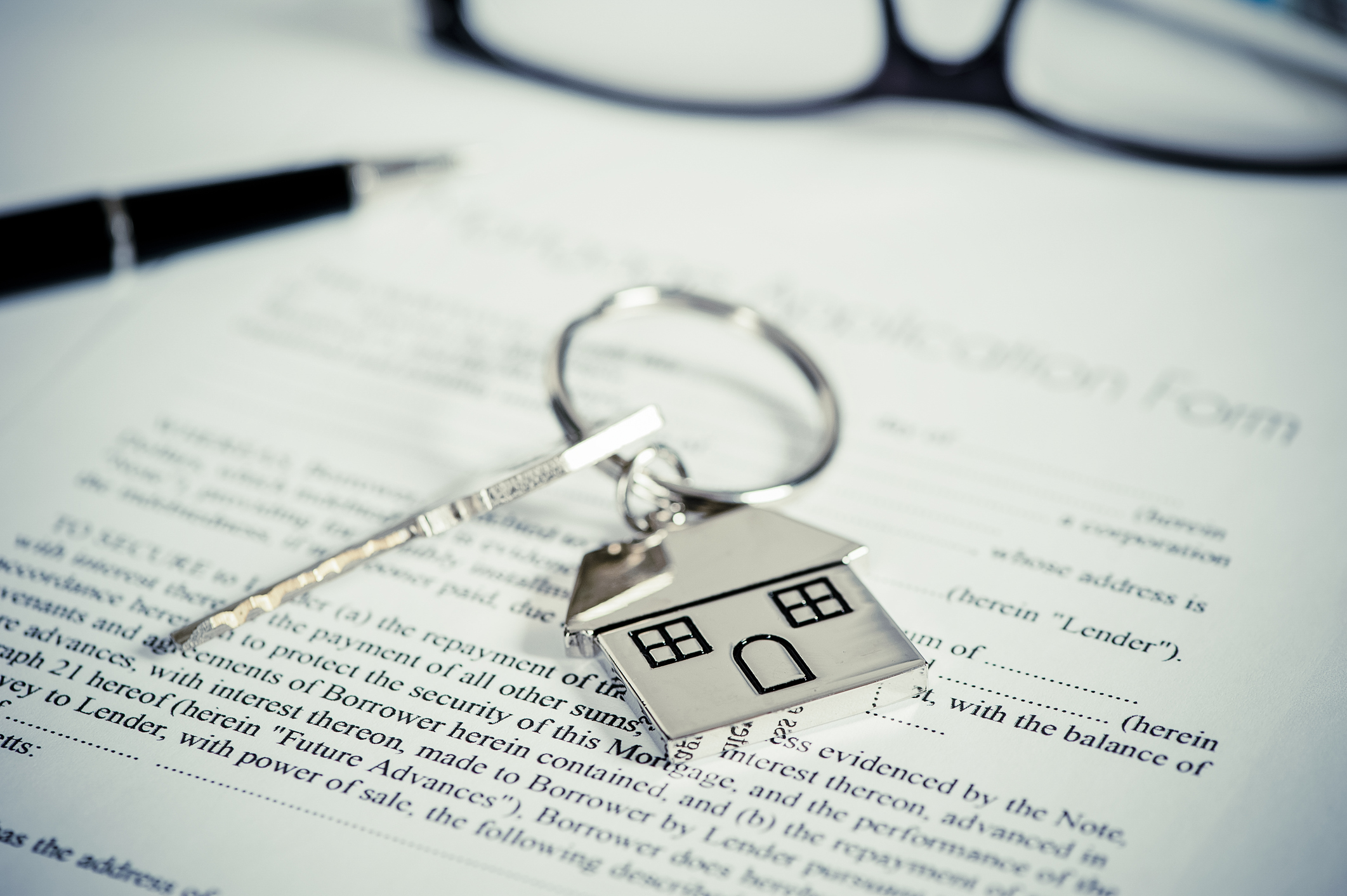 Mortgage document with key