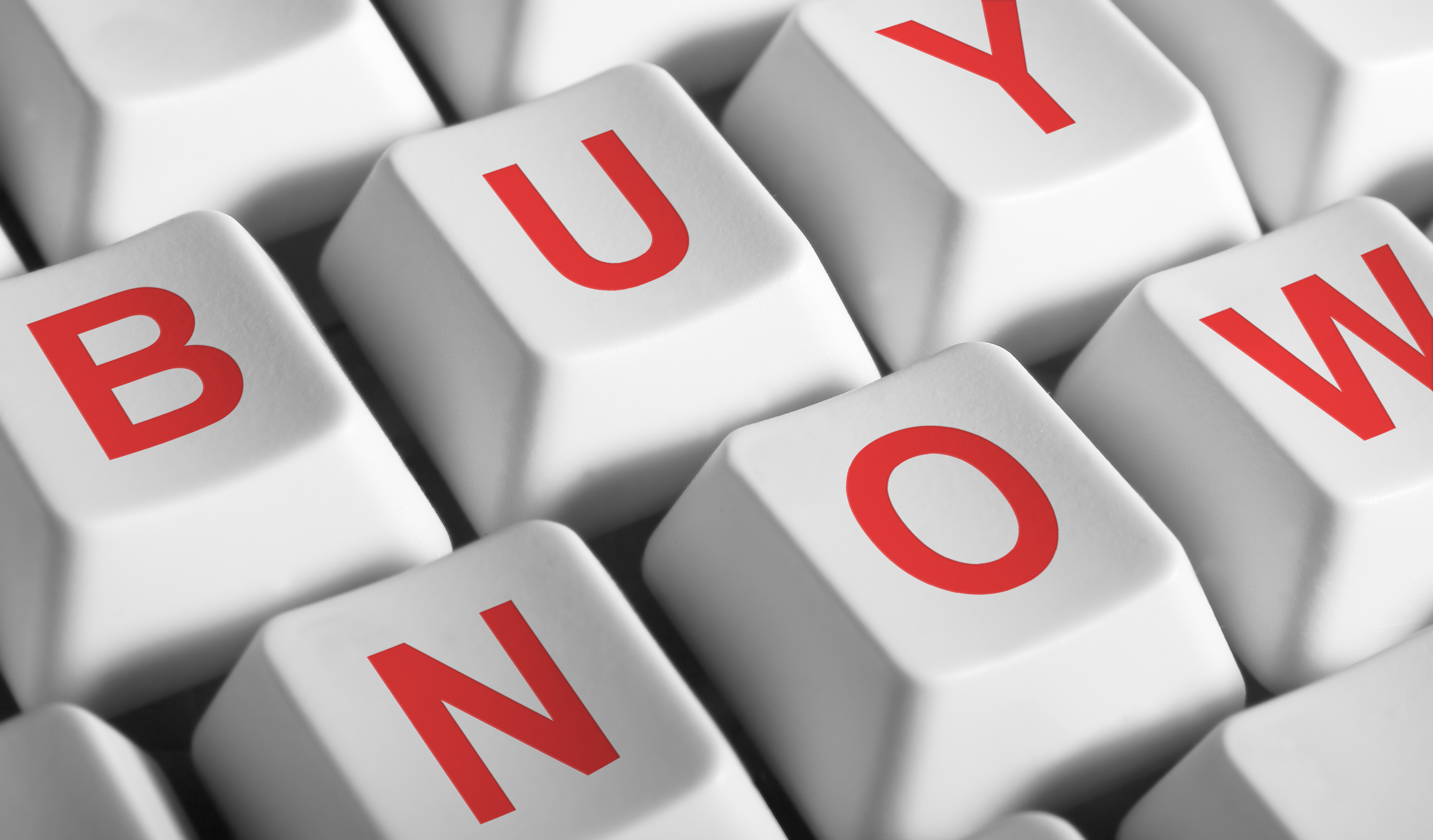 Keyboard keys spelling buy now.