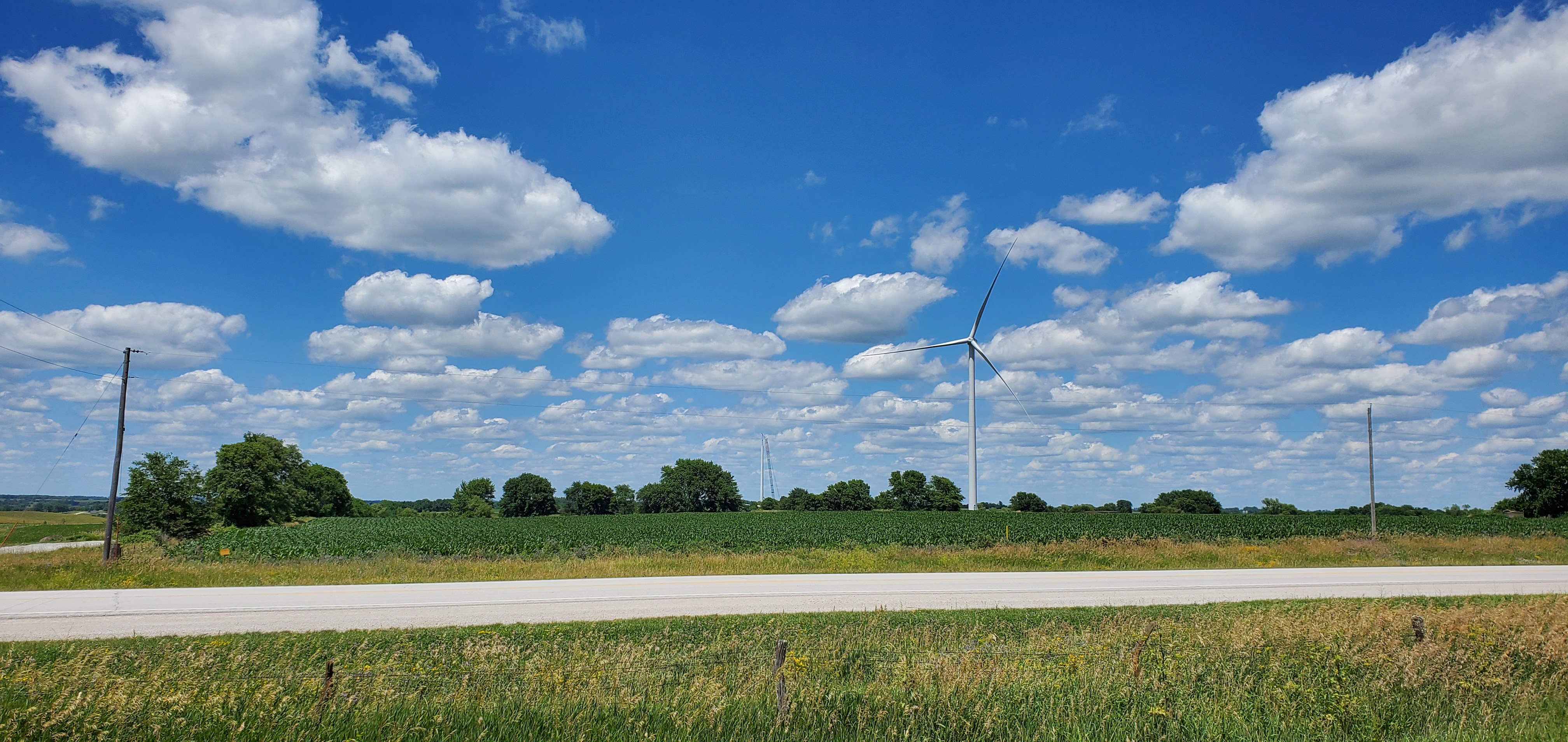 A GE wind turbine in a field