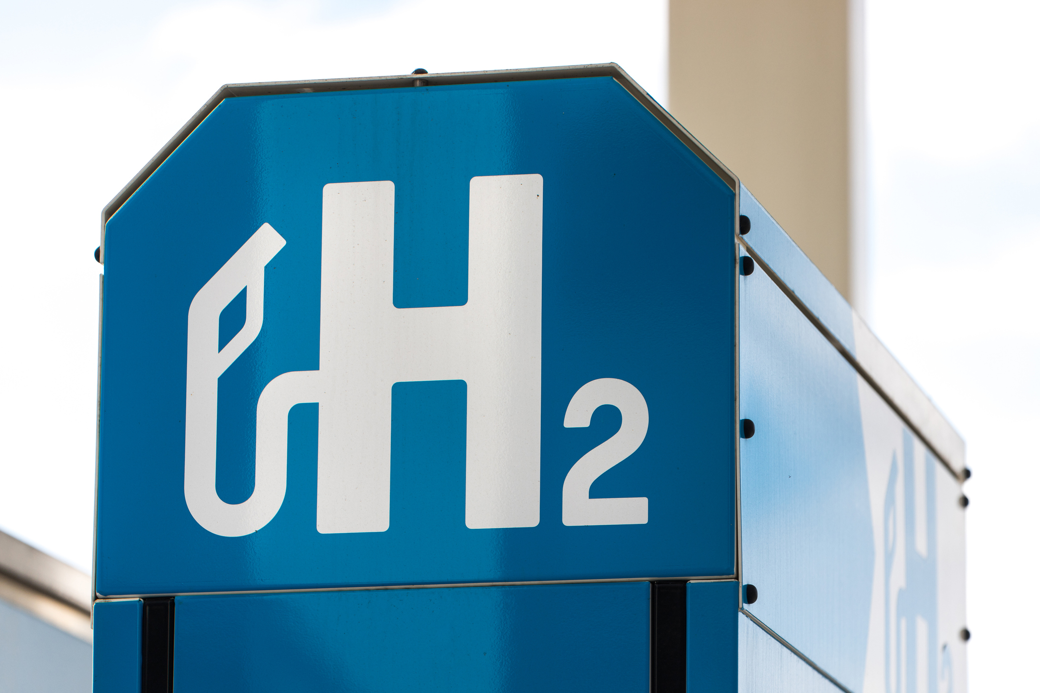 h2 fuel symbol on a large, metal structure.