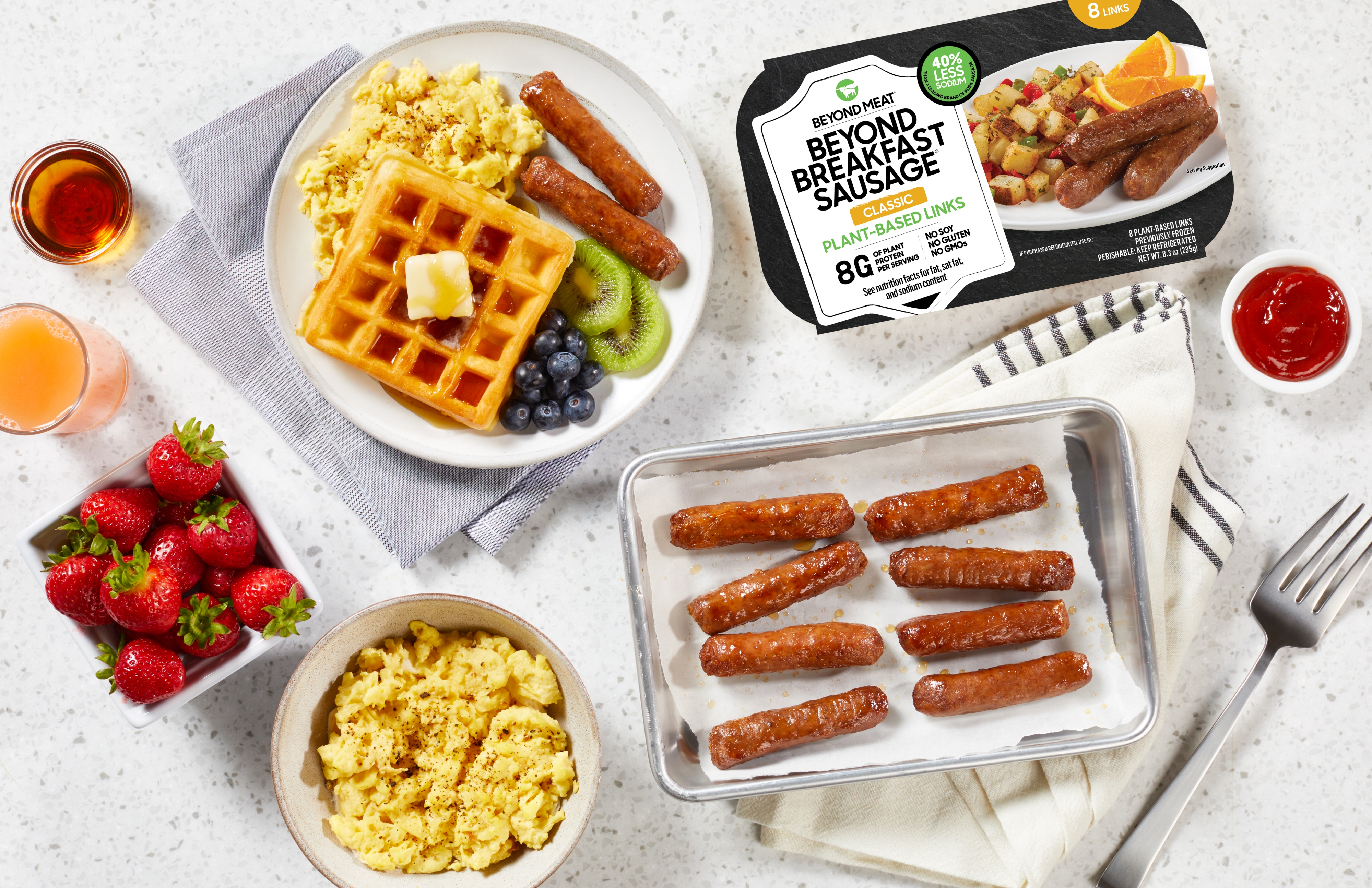 Beyond Breakfast Sausage Links along with waffles, blueberries, and other breakfast foods.