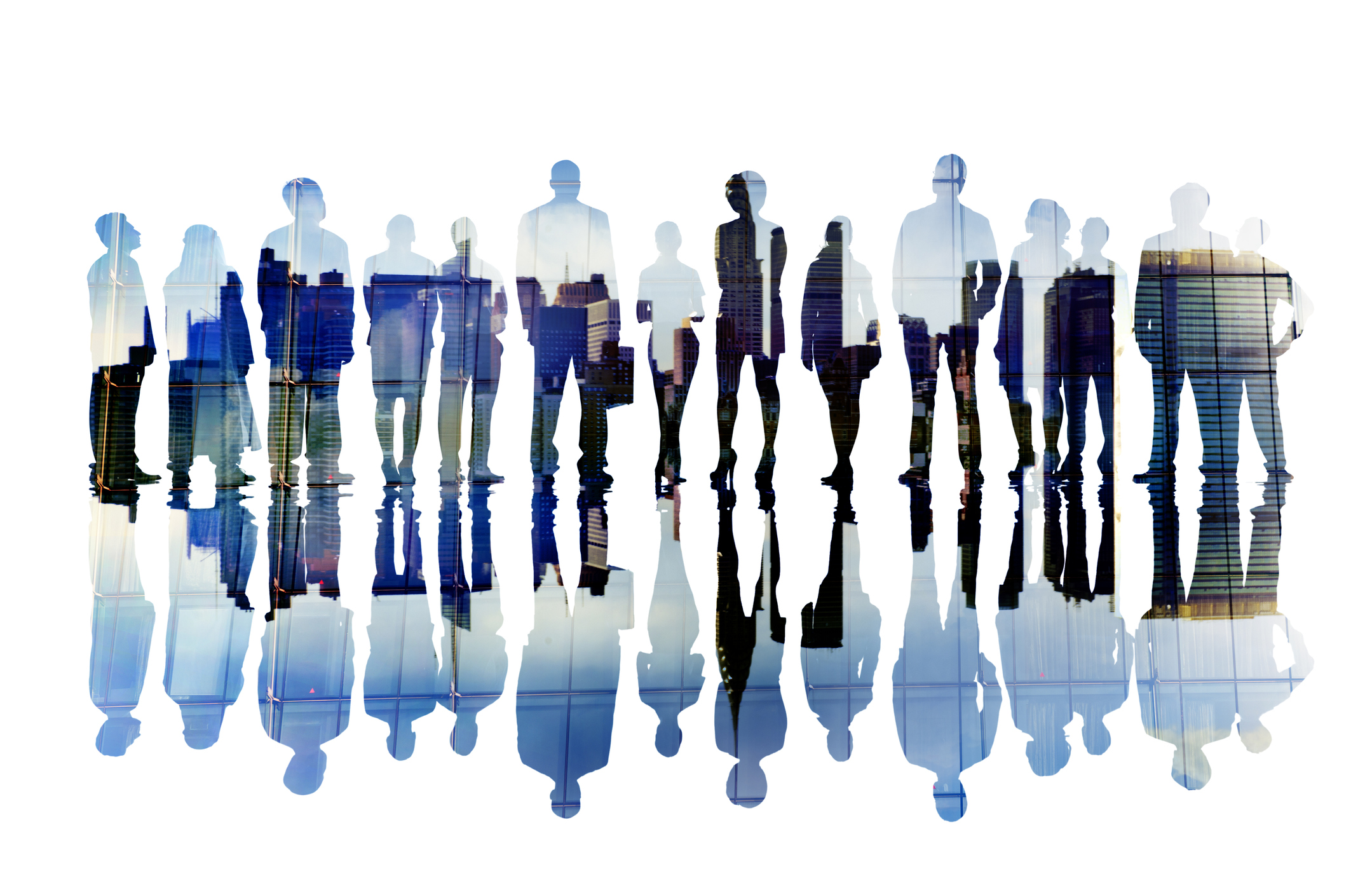 Silhouettes of businesspeople against a city backdrop.