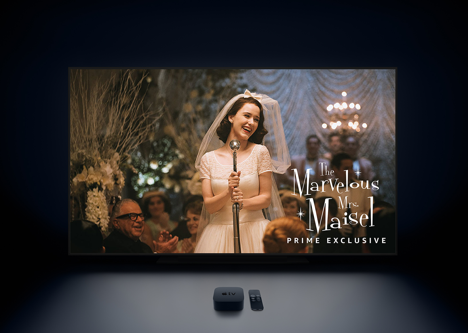 Apple TV set-top box next to remote in front of TV showing a still from "The Marvelous Mrs. Maisel"