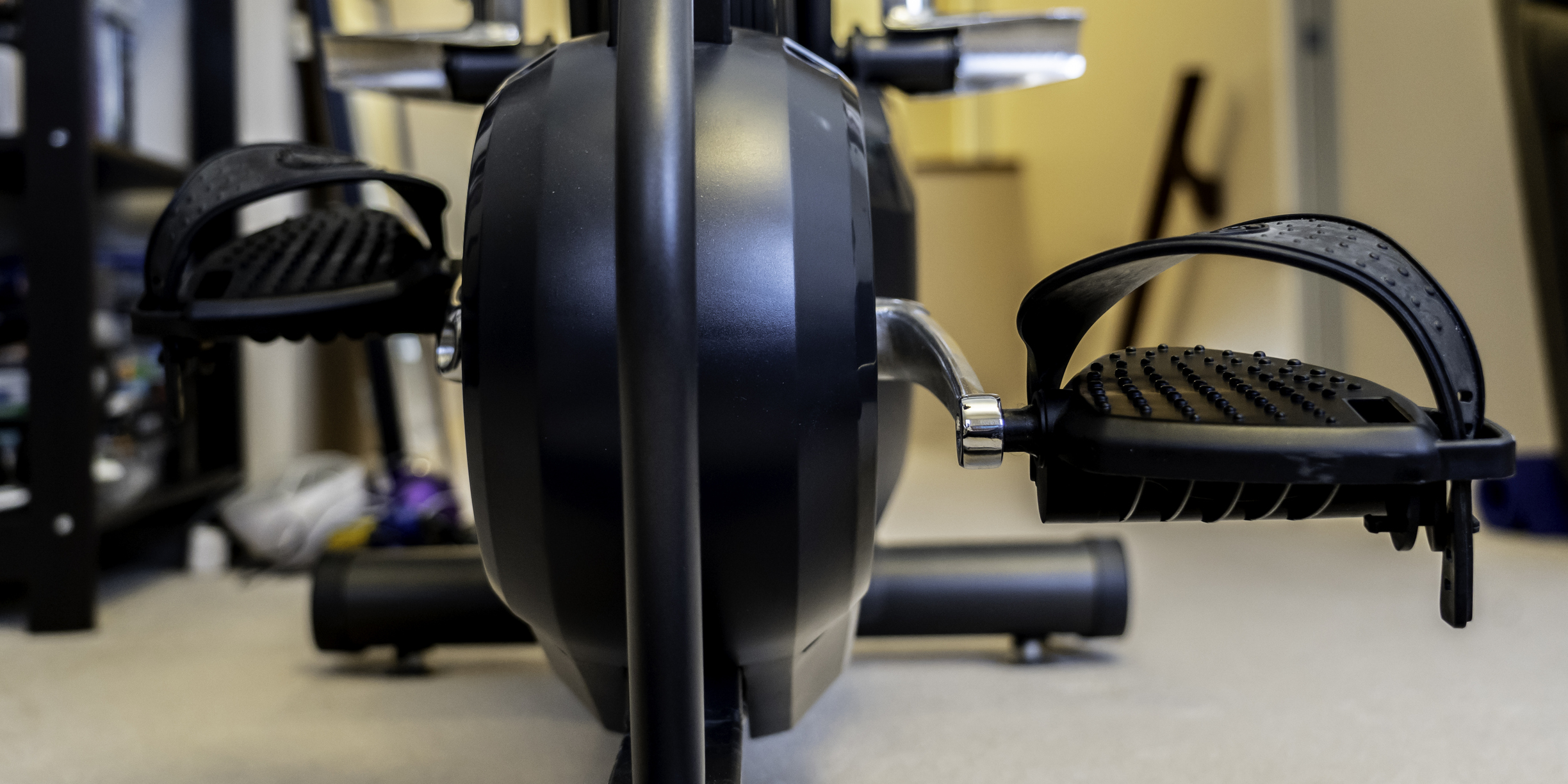 An exercise bike in a home gym