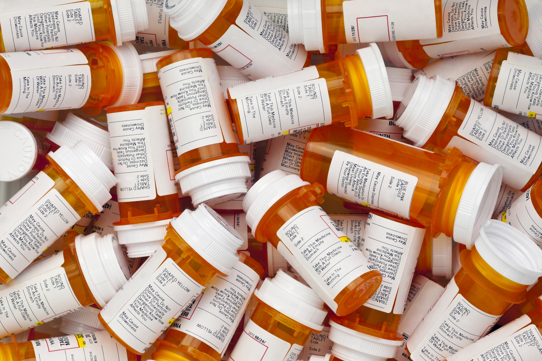 Pile of prescription pill bottles