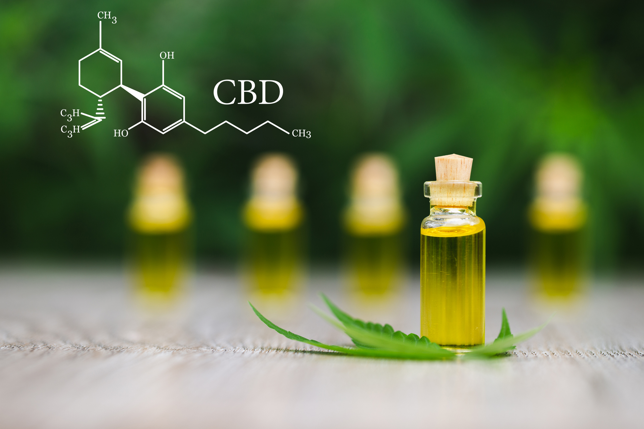 CBD element overlay with glass oil jars and cannabis leaf