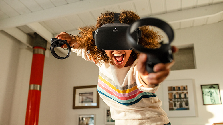 Person playing game on Oculus Quest headset. 