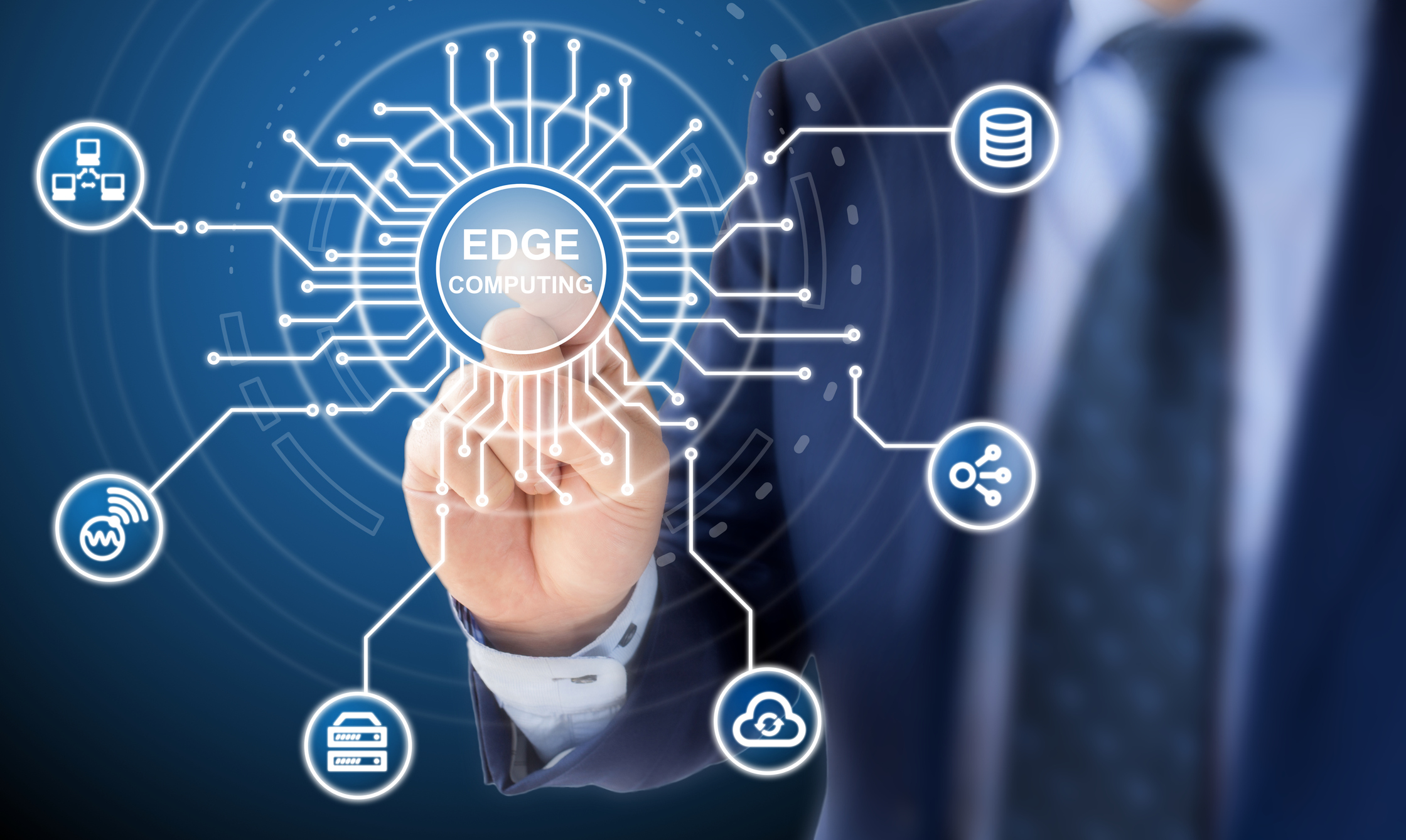 Businessman pointing to graphic image for edge computing
