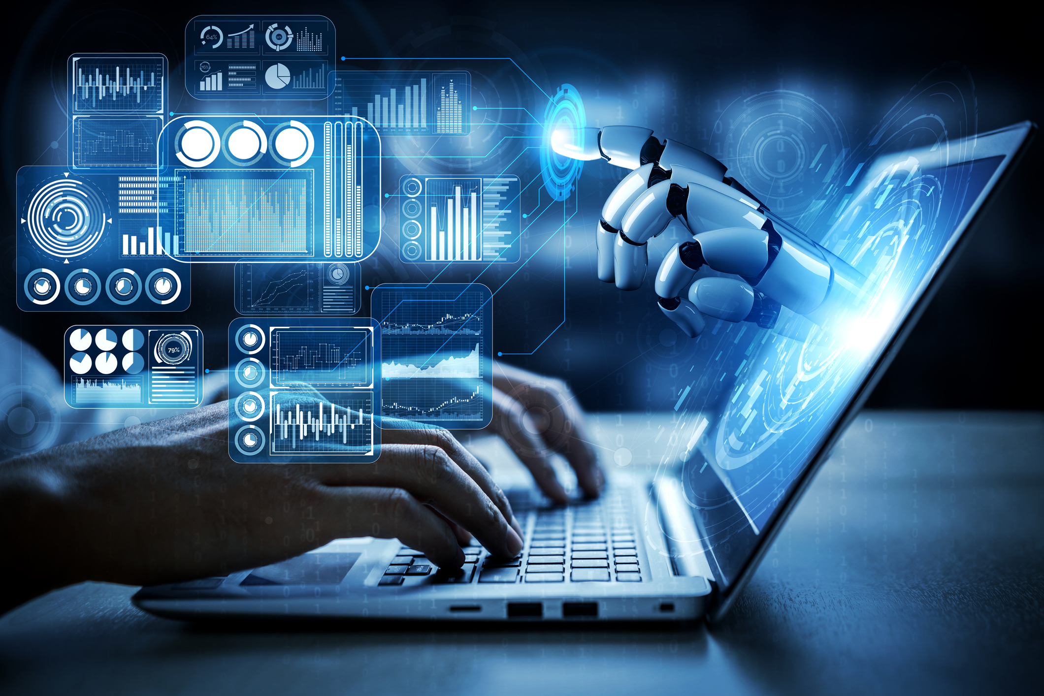 Person typing on laptop with robot hand reaching out of it