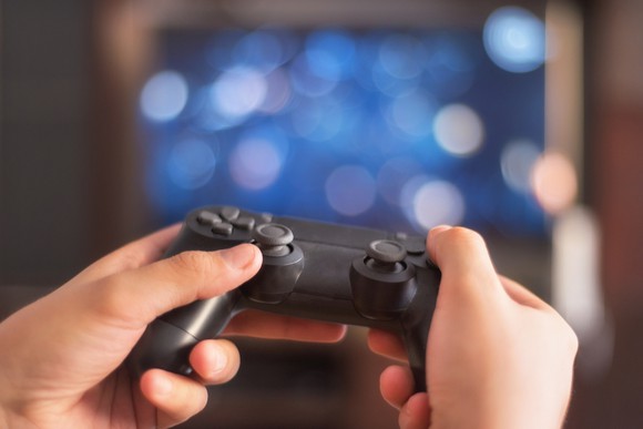 Person using a game controller.