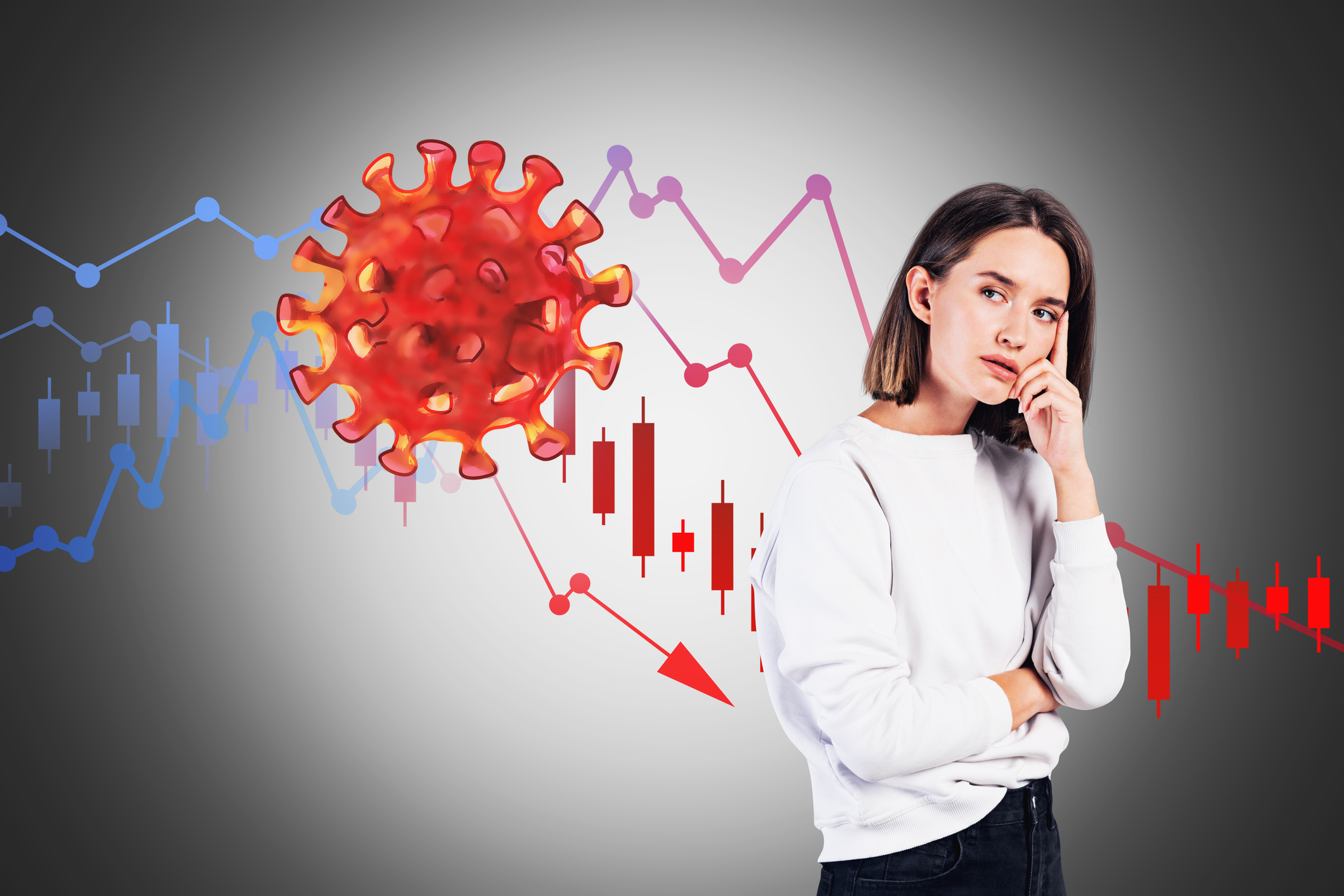 A woman looking concerned as she eyes a COVID-19 particle and a stock chart arrow moving lower.