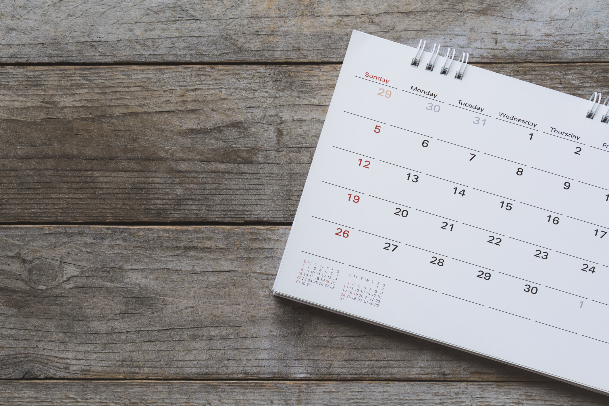 Calendar sitting on wooden surface