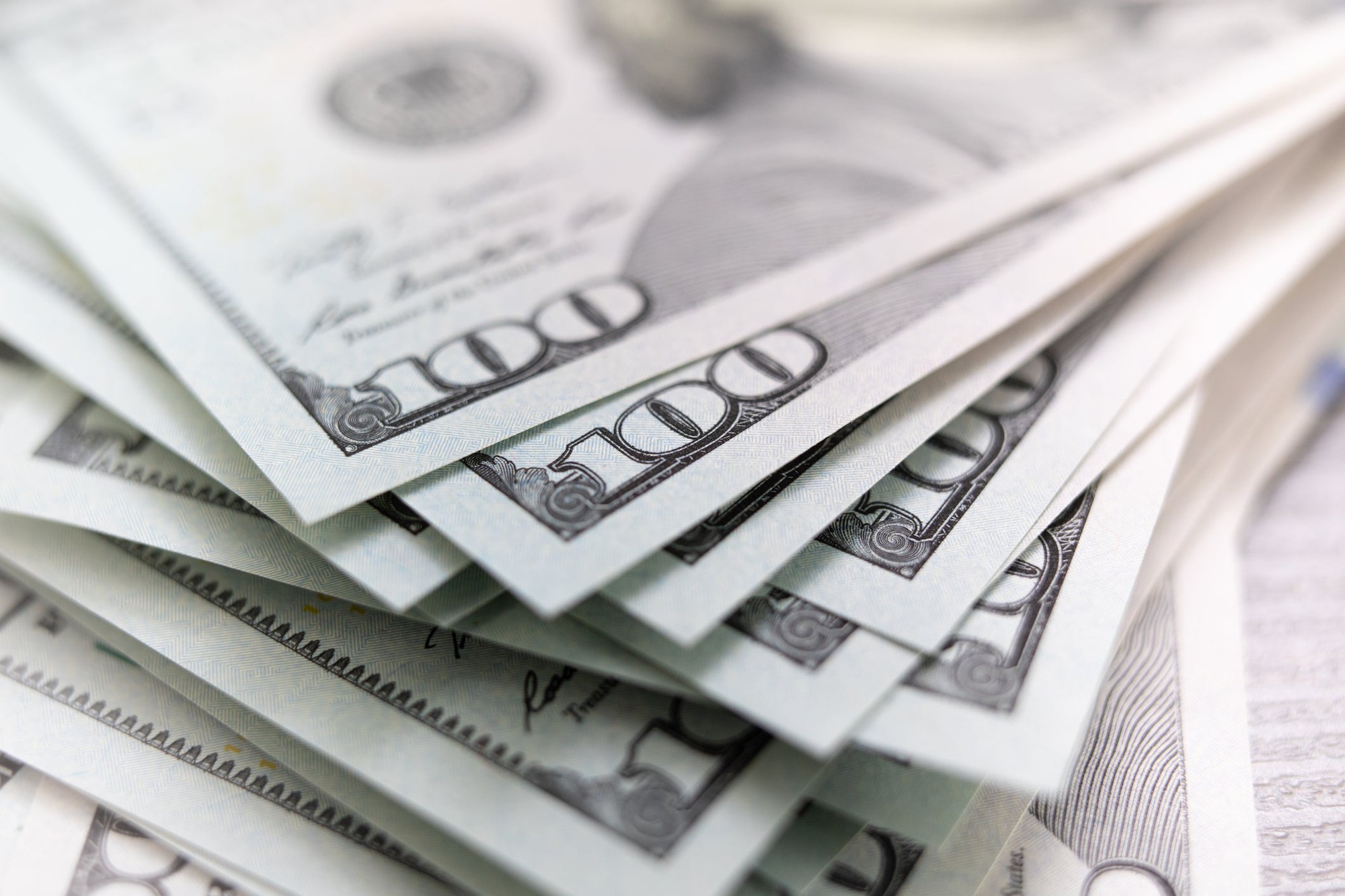 Stacks of $100 dollar bills.