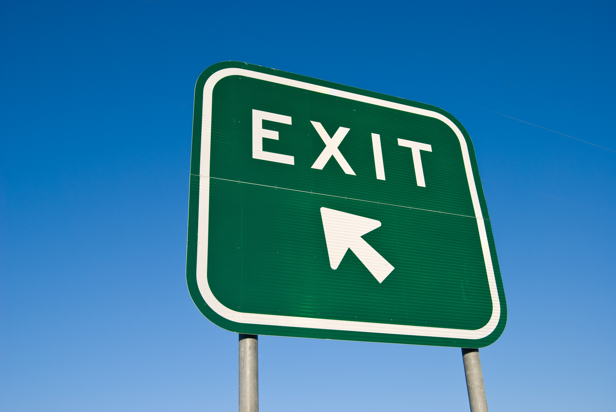 A road sign reading "EXIT."