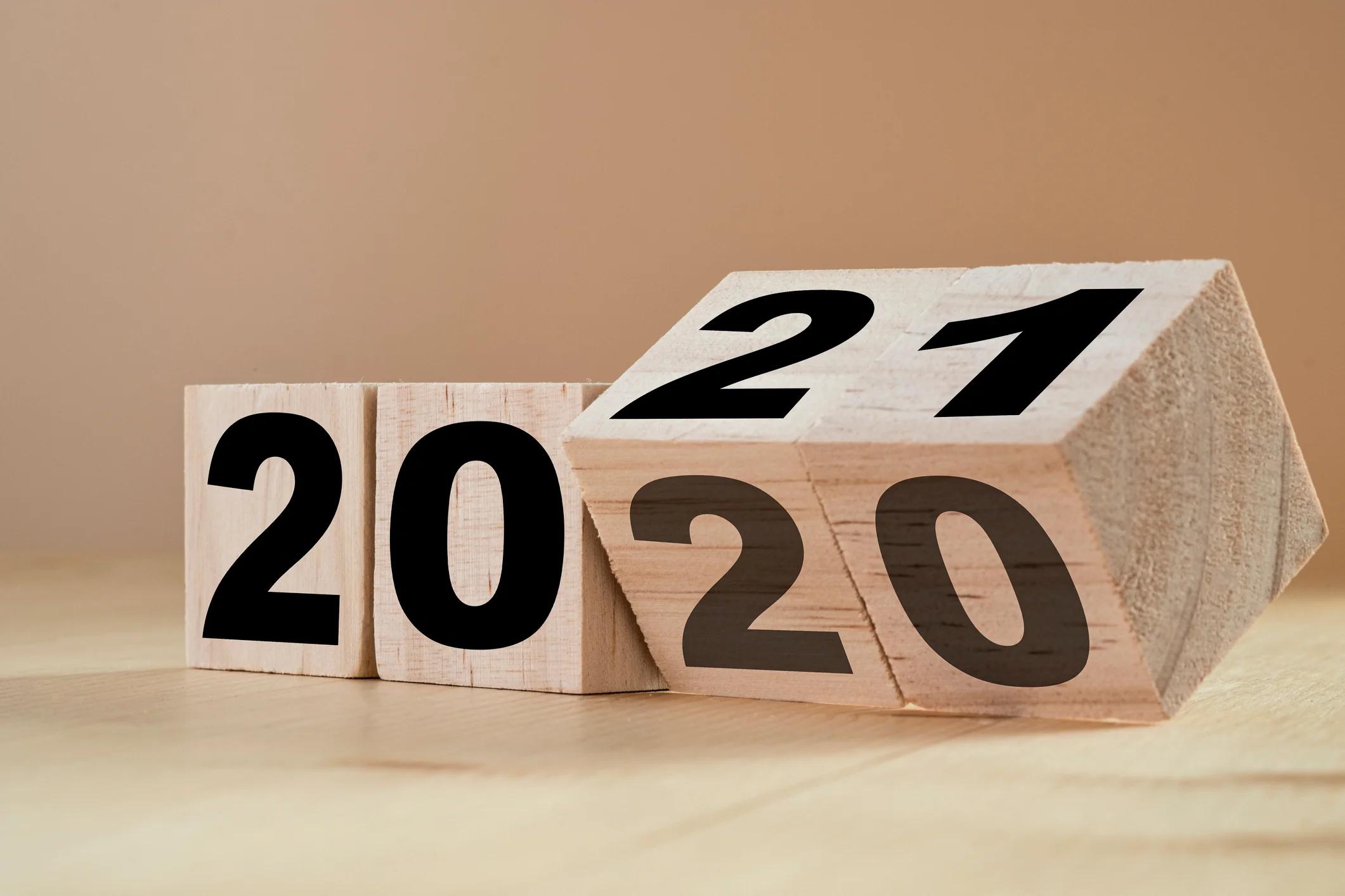 Wood number blocks showing a turn from 2020 to 2021.