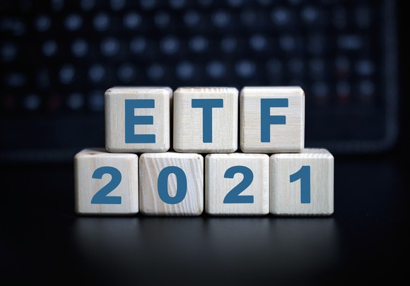 Wooden blocks arranged and stacked to spell out "ETF 2021"