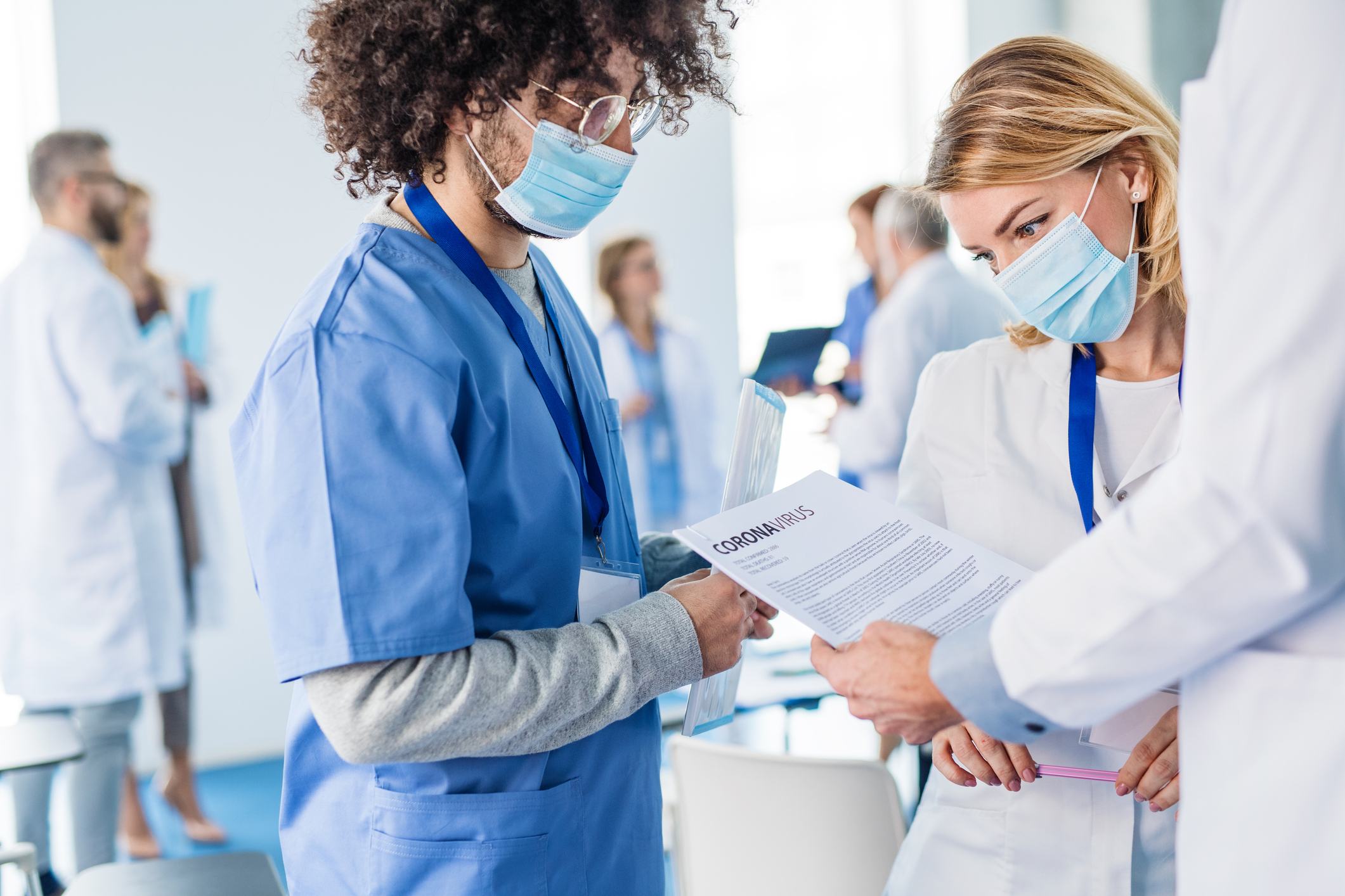 Doctors looking at something.