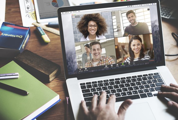 A computer shows its owner is engage in a video message through Zoom.