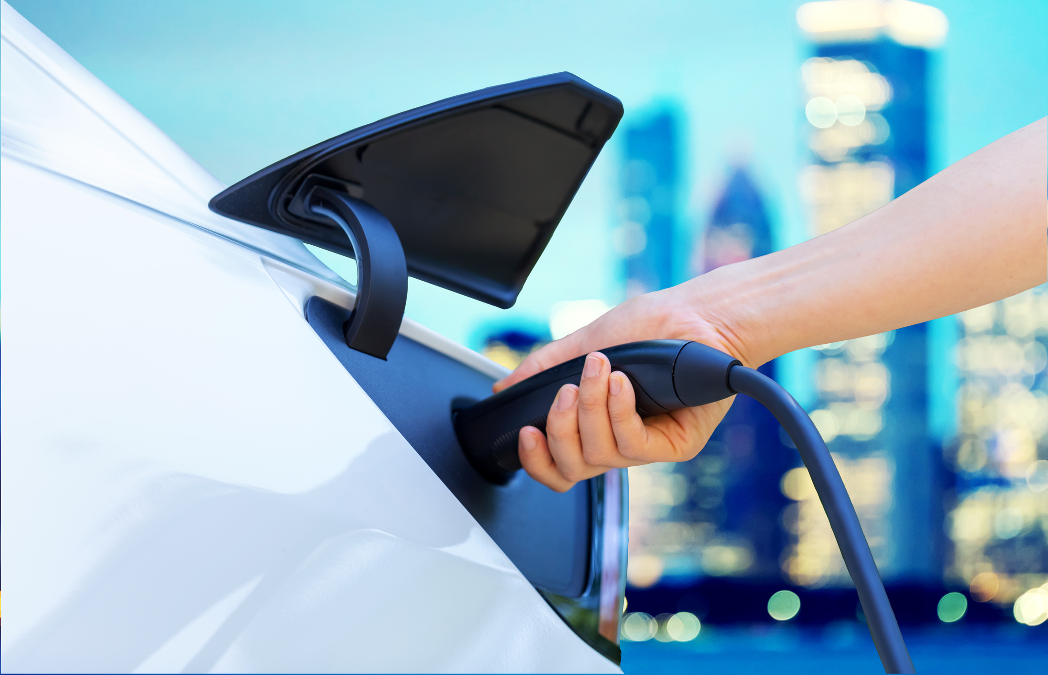 Electric vehicle being charged.